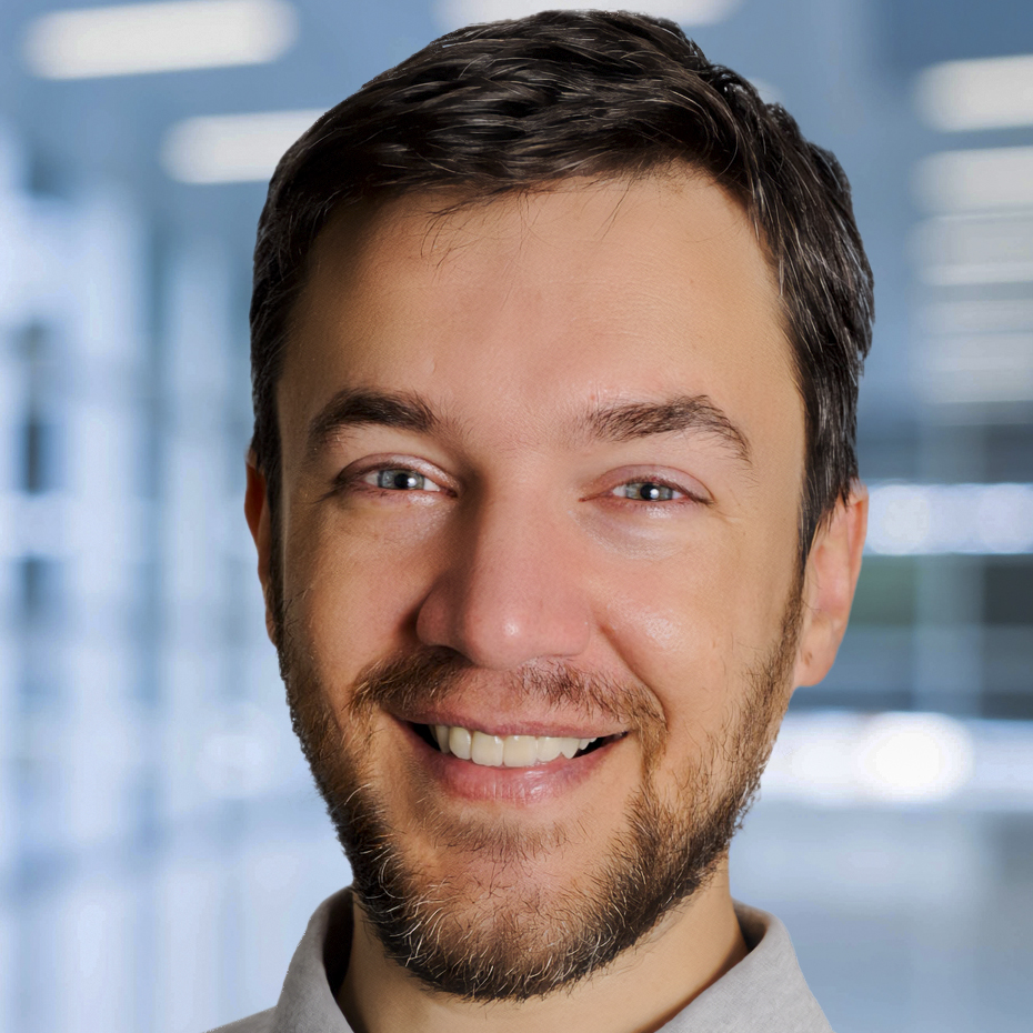 Portrait of Mauro Marinello smiling in a bright office setting